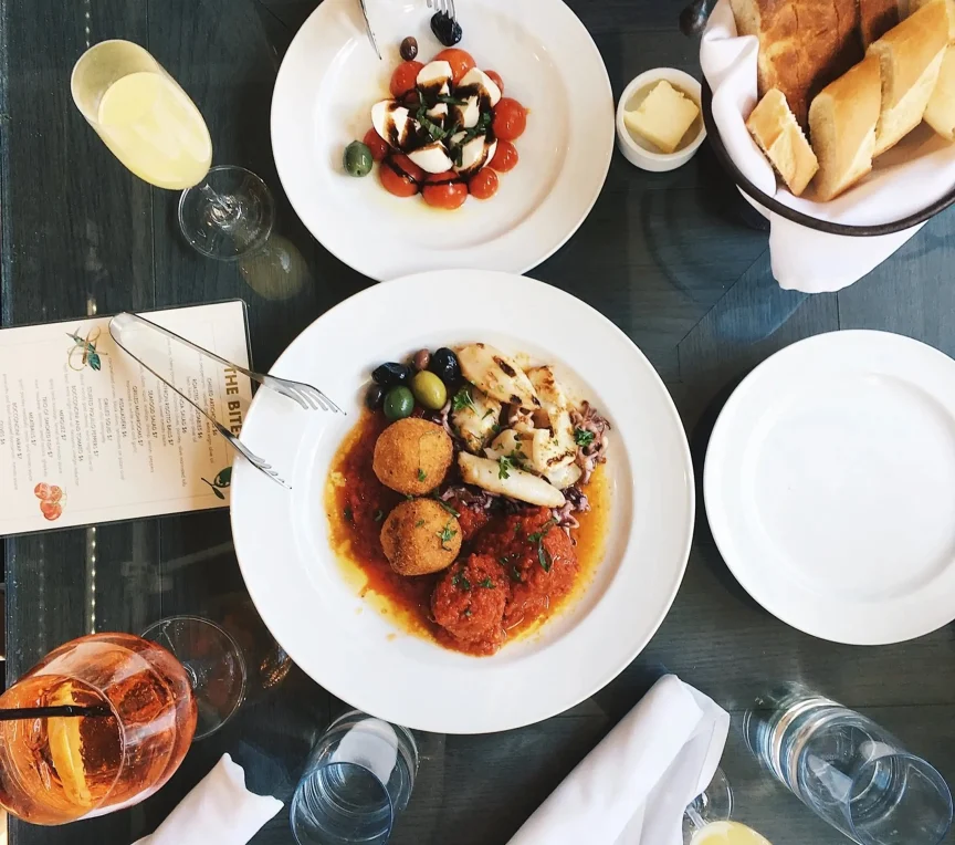 Farm-to-table brunch spread with wine and fresh local bread