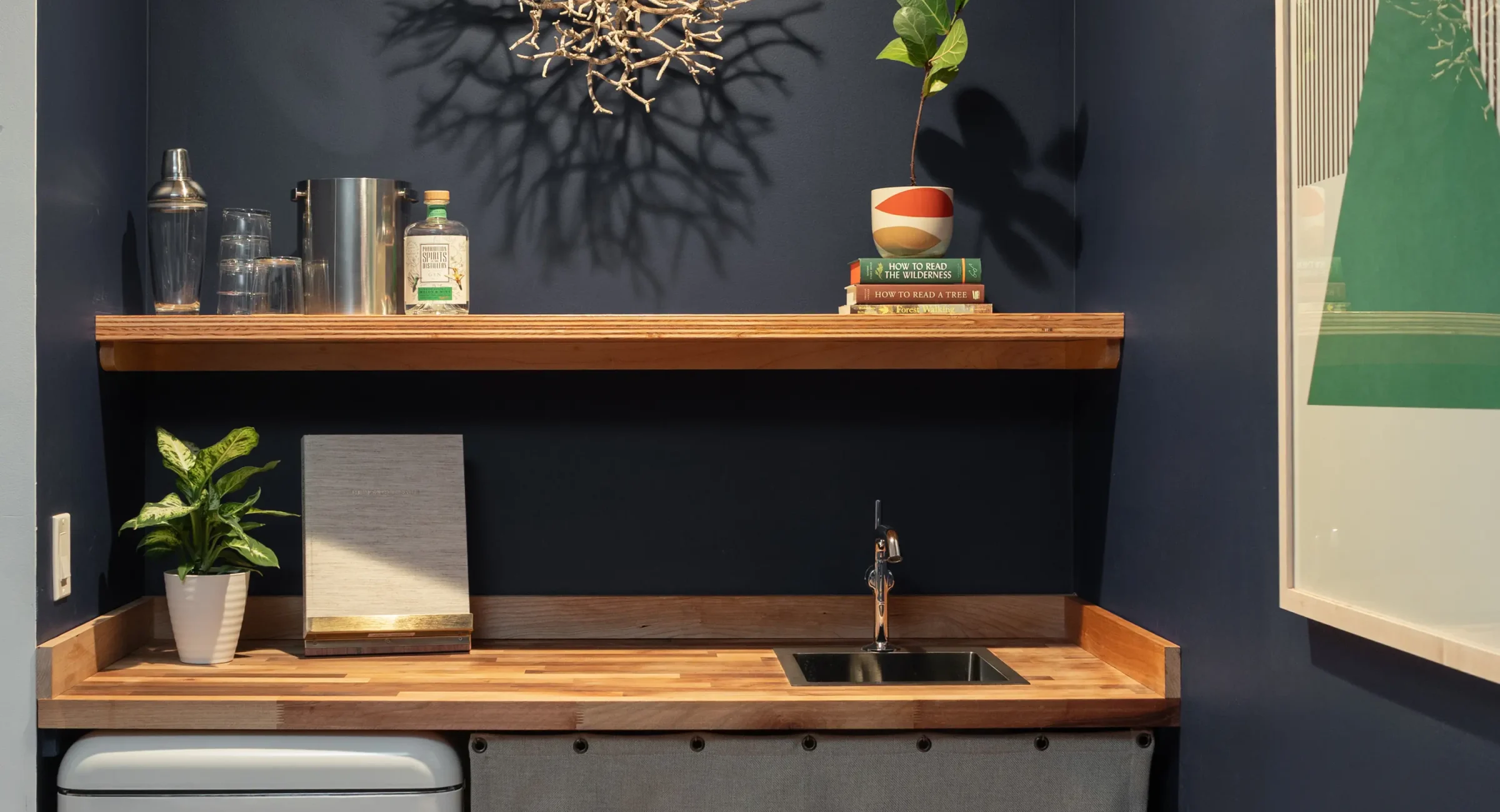 Mendocino Coast hotel suite kitchenette with retro-style mini fridge and wood countertop