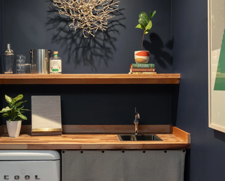 Mendocino Coast hotel suite kitchenette with retro-style mini fridge and wood countertop