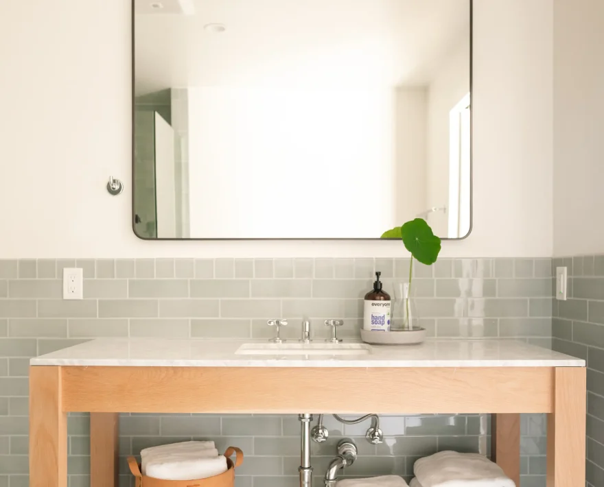 Modern vanity sink with wood counter in Mendocino coast inn