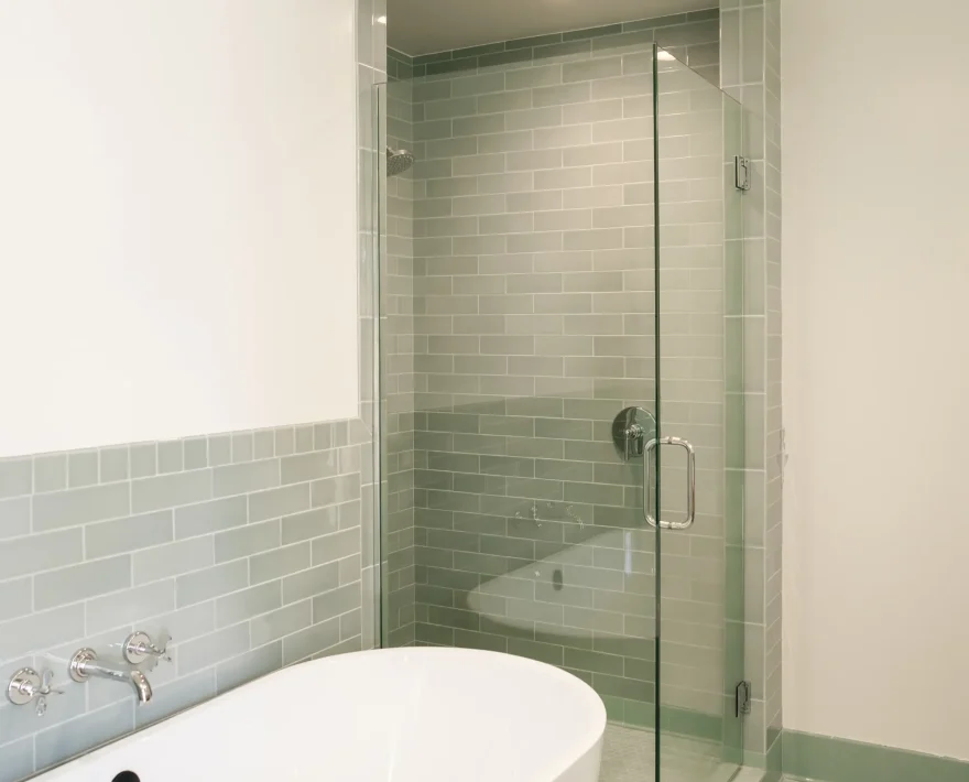 Luxury bathroom with walk-in shower and soaking tub Mendocino CA hotel